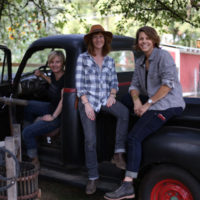 Founders Sara DeLuca, Kyle Marie Begley and Kate Day on Anne Briggs' (@anneofalltrades) farm.