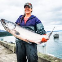founder /fisHERman Sarah with a Copper River King Salmon